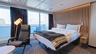 Arctic Superior | Wheelchair-accessible outside cabin with balcony on MS Roald Amundsen